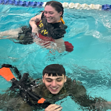 Pictured is Cadet Nicholas D’Armetta conducting the 15m Swim with Cadet Chrystal Corcodilos as lifeguard. 