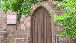 Image of the chapel door on campus. 