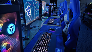 Esports lab with branded chairs and computers