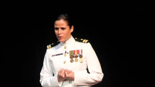 Egdanis Sierra Torres, Lieutenant and Public Affairs Officer, U.S. NavyPhoto of Egdanis Sierra Torres taking a photoPhoto of Egdanis Sierra Torres at a TedX talk