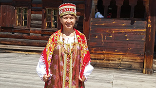 Photo of Slavic Easter Eggs. Pysanky in Ukrainian; pisanki in Polish.Photo of Dr. Irina Kazakevich, Professor of Russian, in a Slavic folk costume.