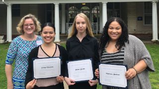 Marissa Barbosa delivers keynote address at BCWEP Recognition Ceremony. (l-r) Professor Mary Landriau with Yenny Masmela, Rachel Brooks, and Marissa Barbosa who will begin work at NJ DCP&P after graduating from the BCWEP program this May.