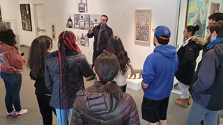 Professor Schiller's students visit the Walsh Gallery and Archives.Open reception at the ‘Spirit + Matter’ Exhibit.Professor Oates and class.