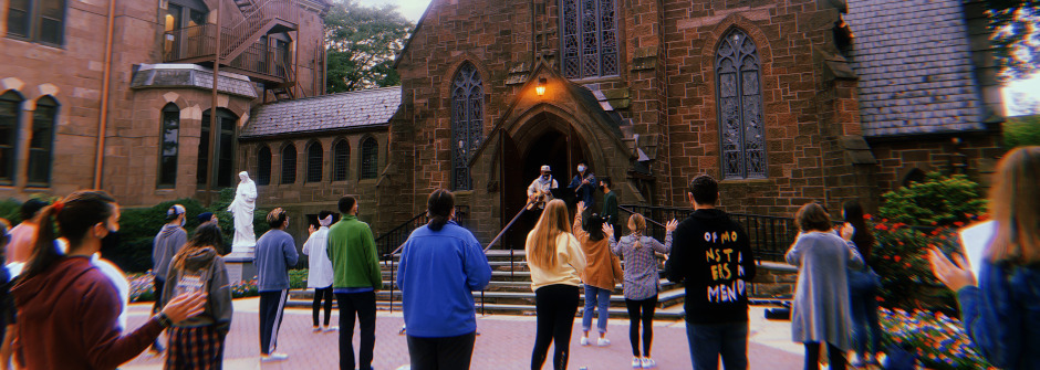 Students standing outside the chapel. 