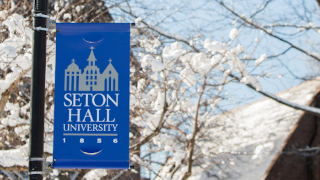 Seton Hall University Banner in snow
