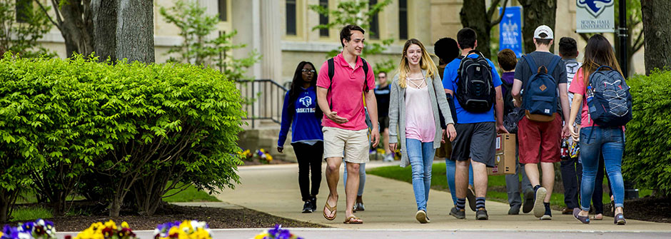 Students Walking Across the Seton Hall Campus