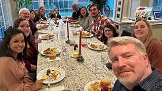 Amy Newcombe and family hosts Thanksgiving.