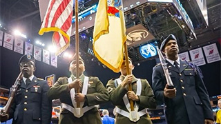 The Pirate Battalion presented the Colors at basketball game