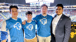 Esports team facing off in a match, live from the Prudential Center at the half-time of the Big East halftime showcase.