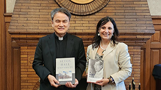 Interim President, Katia Passerini, with Catholic University President, Father Luke Jongchul Won