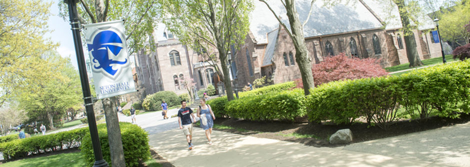 Students walking in front of the chapel 
