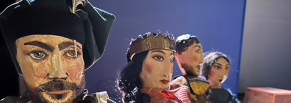 Image of four puppets from the play "Liberi Tutti!"