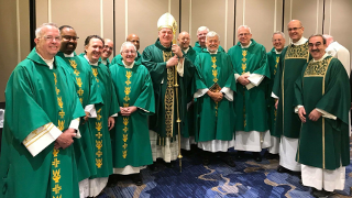 Dianne Traflet speaking at the 2018 National Diaconate Conference in New Orleans.Cardinal Tobin poses with deacons from the Archdiocese of Newark.