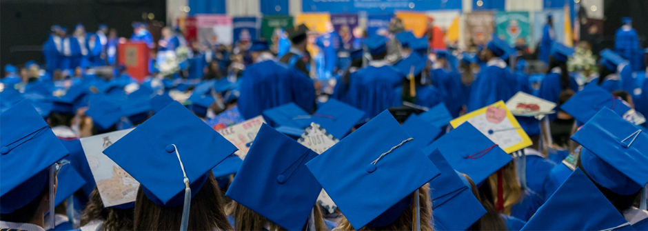 Image of the back of graduation caps at Seton Hall's 2023 commencement ceremony. 