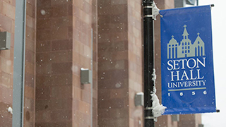 Seton Hall Sign on Campus in the Winter 320